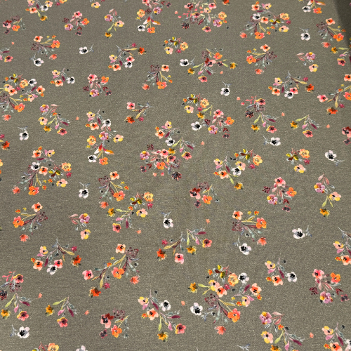 Baumwolljersey in grau mit Streublumen