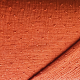 Musselin mit Tupfen in orange