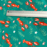 Baumwolljersey in Türkis mit Hummer