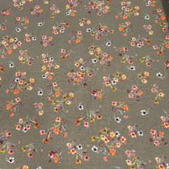 Baumwolljersey in grau mit Streublumen