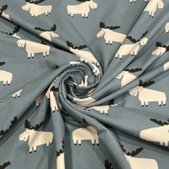 Baumwolljersey Elche auf jeansblau